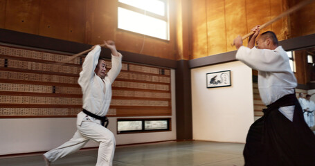 Aikido man with sensei, wooden sword and fight training in fitness, battle or action in traditional...