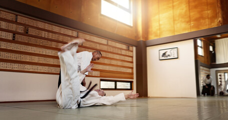 Black belt students, throw or sensei in dojo to start practice lesson, discipline or teaching self...