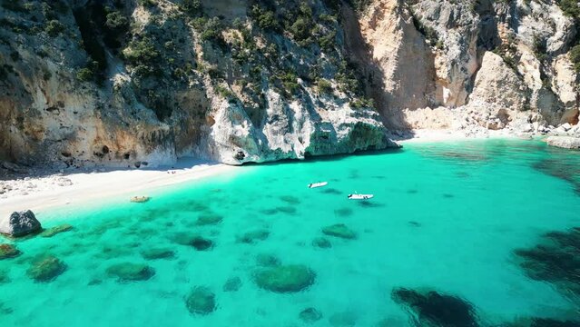 A drone view of Cala Goloritzé, an azure beach located in the town of Baunei, in the southern part of the Gulf of Orosei, in the Ogliastra region of Sardinia.