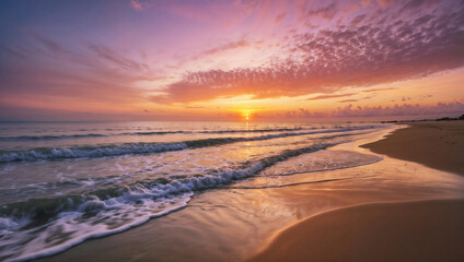 A serene beach scene at sunset with waves gently washing ashore