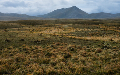 Fototapeta premium mountain landscape inside the National Park of Gran Sasso and Monti della Laga during an autumnal and cloudy morning, L'Aquila, Italy 
