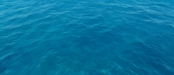 Fototapeta na wymiar Surface of the sea. Blue ocean water texture background.