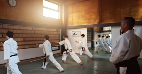 Japanese students, teaching or sensei in dojo to start aikido practice, discipline or self defense...