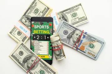 Fotobehang Sport betting online banner concept. app online bet on soccer. Mobile phone with soccer field on screen and realistik football ball in front. illustration © Angelov