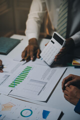 Business team meeting present, investor colleagues consultation and conference new strategy plan business and market growth on financial document graph report, Meeting and Talking.