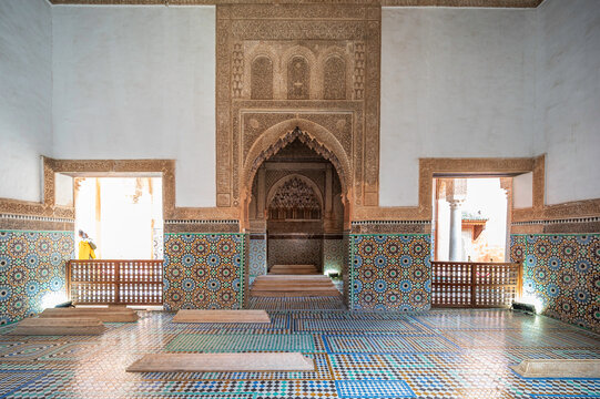 Very ornate, arabic archway, covered in carved wood and mosiac tiles. 