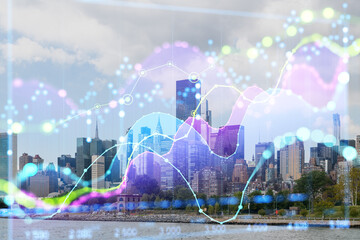 Double exposure of New York cityscape with holographic data graphs, highlighting concepts of...