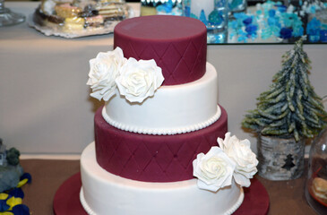 Wedding cake decoration with colorful flowers, it is served at wedding receptions. Vintage style for weddings, birthdays.
