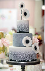 Wedding cake decoration with colorful flowers, it is served at wedding receptions. Vintage style for weddings, birthdays.
