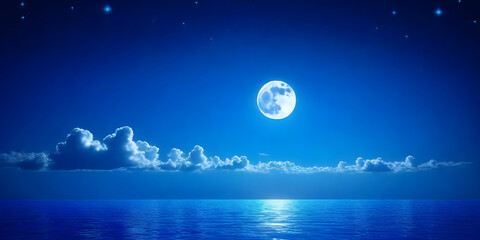The full moon casts a bright light over the calm ocean waves