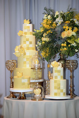 Wedding cake decoration with colorful flowers, it is served at wedding receptions. Vintage style for weddings, birthdays.
