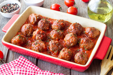Meatballs in tomato sauce with herbs. Paste. Italian Cuisine.