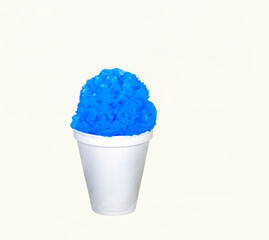 Blue Raspberry Hawaiian Shave Ice, Shaved Ice or a Snow Cone in a white cup on a white background with copy space.
