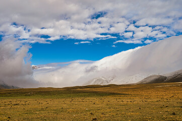 mountain landscape inside the National Parl of Gran Sasso and Monti della Laga during an autumnal and cloudy morning, L'Aquila, Italy     