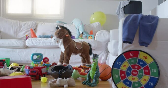 Colorful assortment of children's toys scattered in a bright living room