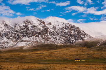 mountain landscape inside the National Parl of Gran Sasso and Monti della Laga during an autumnal and cloudy morning, L'Aquila, Italy     