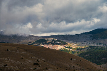 mountain landscape inside the National Parl of Gran Sasso and Monti della Laga during an autumnal and cloudy morning, L'Aquila, Italy     