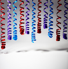 decorative blue, red and purple streamer ribbons - 779789854
