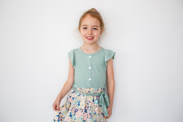 Cute girl 4 year old posing in studio - 779791678