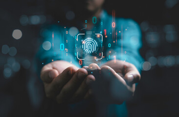 Businessman holding virtual finger print and binary code for internet access and biometric encryption for cybersecurity network and user security concept.