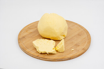 Natural butter on a wooden base