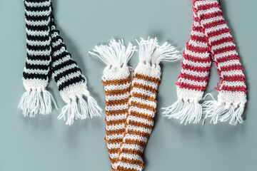 Set of striped scarves made of wool. Protecting the neck and throat from cold weather.