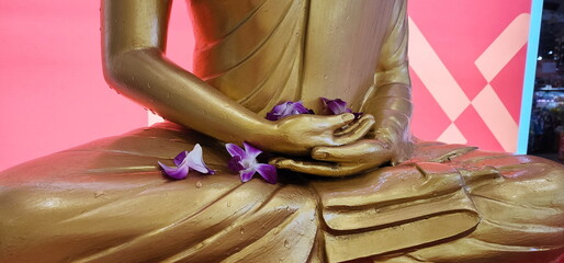 Buddha images are enshrined at community sites for people to bathe in during the Songkran festival....