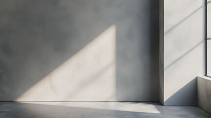 Minimalist interior corner with light casting geometric shadows on wall and floor