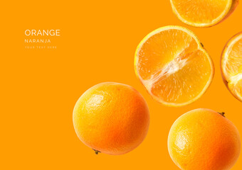 Creative layout made of flying oranges on the orange background. Food concept. Macro concept.