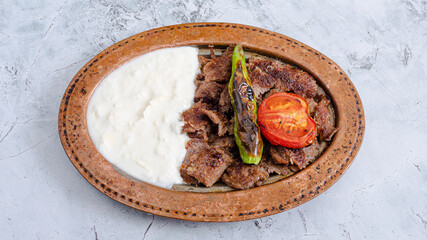 Beef Iskender doner kebab plate top view	