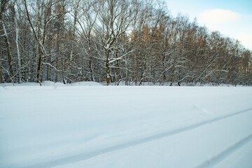 Snow-covered railway tracks. Empty railway in winter.