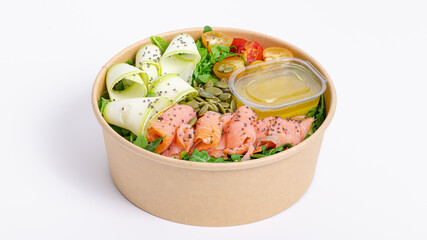 Dietetic salad with ham, bacon and vegetables in paper bowl