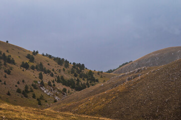 landscape inside Campo Imperatore during an autumnal cloudy day, Parco nazionale Gran Sasso, L'Aquila, Italy