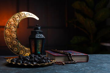 Iftar concept background, Dates with lantern and Quran, Eid Mubarak greeting background