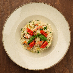 risotto with seafood and shrimps flat lay