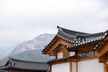 Fototapeta premium Eunpyeong Hanok Village, the largest neo-hanok residential complex in the capital area which surrounded by hills and mountains in Seoul, South Korea