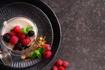 breakfast in a glass granola yogurt and fresh berries