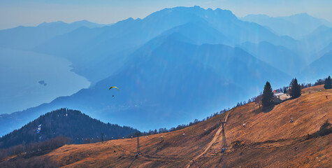Hazy mountain scenery panorama from Cimetta Mount, Ticino, Switzerland