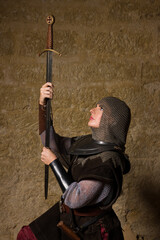 Female knight holding her sword