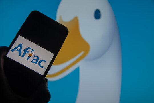 Rheinbach, Germany  13 March 2024,  The brand logo of the American insurance company "Aflac" on the display of a smartphone (focus on the brand logo)