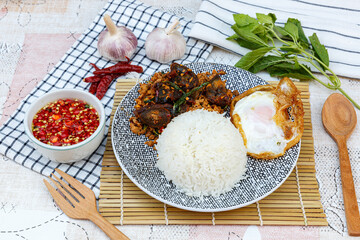 Stir-Fried Basil and Stir Fried Chili with Century Egg and Minced Pork Spicy Thai food