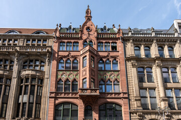 Fototapeta premium Facades of buildings and streets of European cities. Beautiful European buildings.