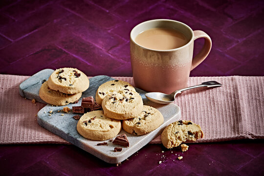 Chocolate chips cookies with a mug of tea