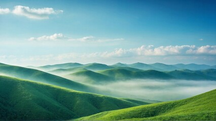 Green Hills Surrounded by Mist Against a Blue Sky, Conveying the Quiet Beauty and Environmental Serenity