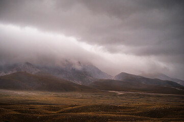 landscape inside Campo imperatore during an autumnal cloudy day, Parco nazionale del Gran Sasso,...