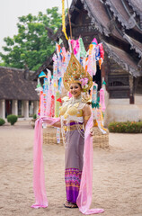 The Thai Songkran Goddess of the year 2024 is named "Nang Moh Thor Thevi." In her right hand, she holds a discus, and in her left, a trident. mounted atop a peacock.