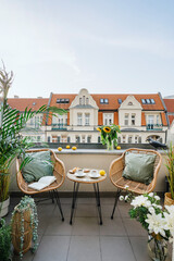 Vertical shot of open terrace or balcony on roof of hotel with cityscape view