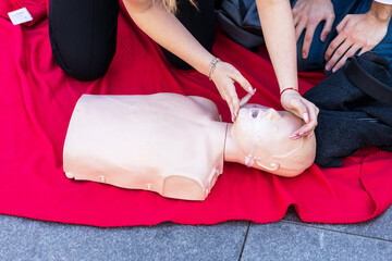 Taking a pulse or heart rate during CPR and first aid