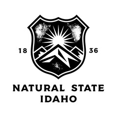 Vintage Idaho state with grunge texture and emblem. Idaho vintage print for t-shirt. Trendy Hipster design. Vector illustration