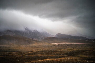 landscape inside Campo imperatore during an autumnal cloudy day, Parco nazionale del Gran Sasso,...
